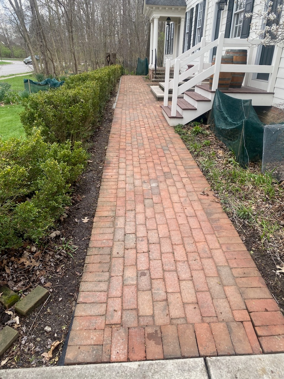Brick paver walkway leading to residential home by Mark Monnette Masonry