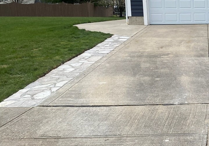 Stone driveway border extension by Mark Monnette Masonry